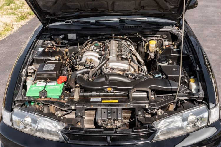 clean under hood stock 1997 nissan 240sx sells for 31k